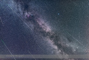 The Perseid meteors shooting through Cygnus and the Summer Triangle area of the summer Milky Way, on the night of Wednesday, August 12, 2015. Deneb is the star at top left, Vega at top right, and Altair at bottom. The Perseids shoot across the frame from top left to bottom right. Other streaks are sporadic meteors or short satellite trails. I masked out other long satellite trails that were distracting to the image’s focus on depicting Perseids. This is a stack of 24 images, each with a meteor or two, taken over a 3.5-hour period that night, with each exposure being 1 minute at f/2, with the 24mm Sigma lens and Nikon D750 at ISO 1600. The 24 image with meteors were selected from a total of 214 shot for this sequence, with most frames not recording any meteor, and perhaps only satellites or aircraft.