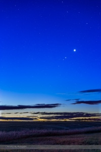 Four planets in the morning sky, on October 20, 2015, along the ecliptic from bottom to top:  - Mercury (close to the horizon at lower left) - Mars (dim, below Jupiter) - Jupiter (fairly bright at upper right) - Venus (brightest of the four) I shot this from home in southern Alberta. This is a composite stack of 5 exposures from 15 seconds to 1 second to contain the range of brightness from the bright horizon to the dimmer sky up higher. All with the 35mm lens and Canon 6D at ISO 800.