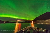 The aurora boralis over a bridge in Norway, as per the legend of “Bifrost,” the bridge between heaven and Earth in Norse mythology. Taken from the Hurtigruten ship the m/s Nordlys on October 23, 2017, on the journey between Svolvaer and Tromsø. Taken with the Sigma 14mm Art lens at f/1.8 and Nikon D750 at ISO 6400 for 1.6 seconds, as part of a 450-frame time-lapse.