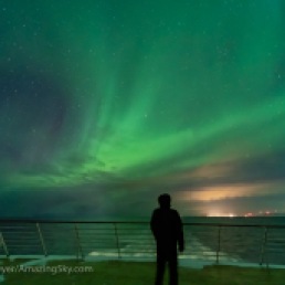 A self-portrait on the back deck of the ms Trollfjord, southbound out of Berlevag this night and under the Northern Lights.